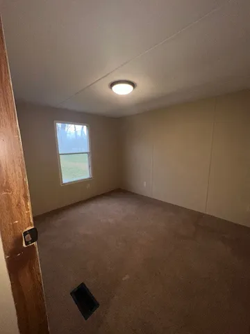 a view of a kitchen with a sink