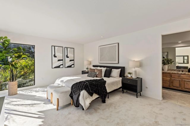 a living room with patio furniture