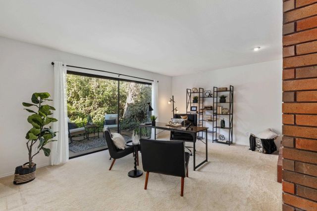 a view of green field with trees