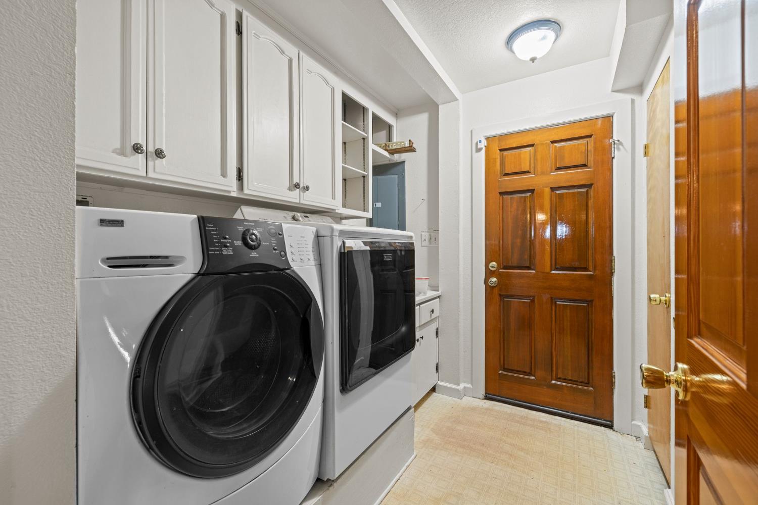 8061 Happy Valley Road Somerset, CA 95684 - Photo 24 of 66 a utility room with dryer and washer