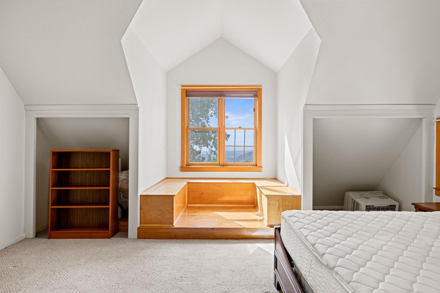 8061 Happy Valley Road Somerset, CA 95684 - Photo 36 of 66 a bedroom with a bed and a window