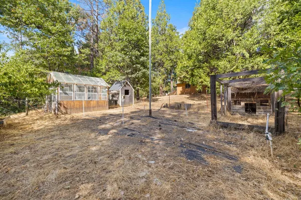 a view of a kitchen with furniture and a window