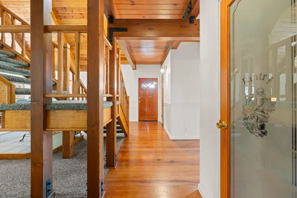 a view of balcony with wooden floor