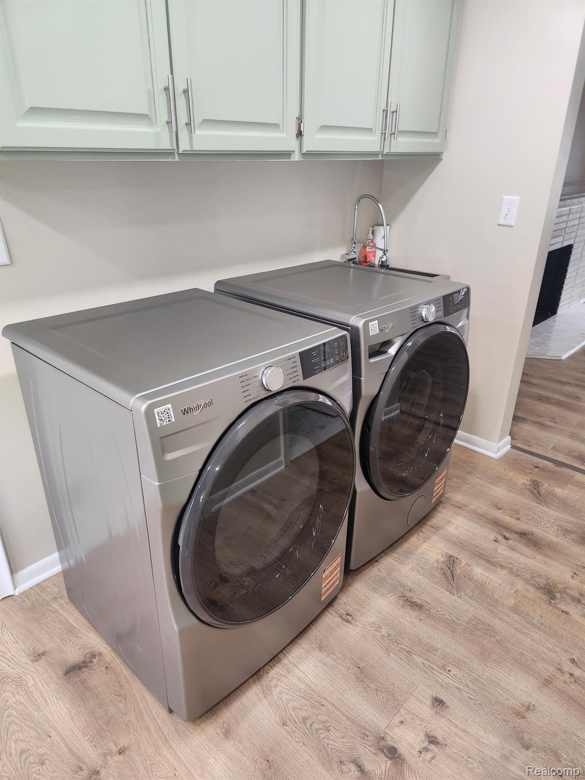 1206 Torpey Road Troy, MI 48083 - Photo 13 of 33 Laundry room with cabinet space, light ! Before removable counter / waterfall installed