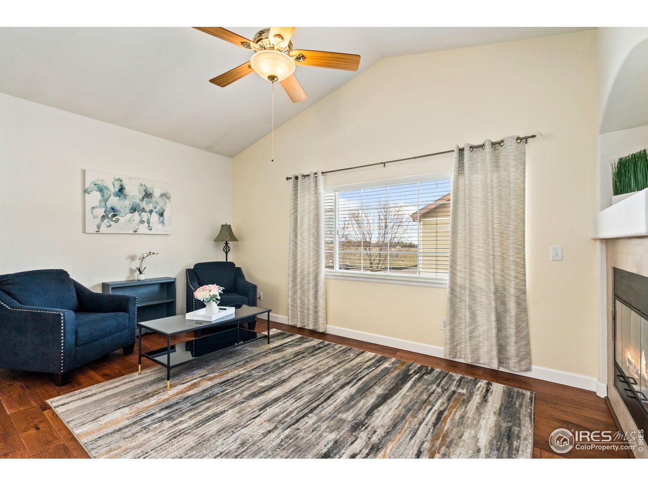 5014 Brookfield Drive, Unit B Fort Collins, CO 80528 - Photo 9 of 18 Hardwood floors, stainless appliances, vaulted ceilings, and a gas fireplace!