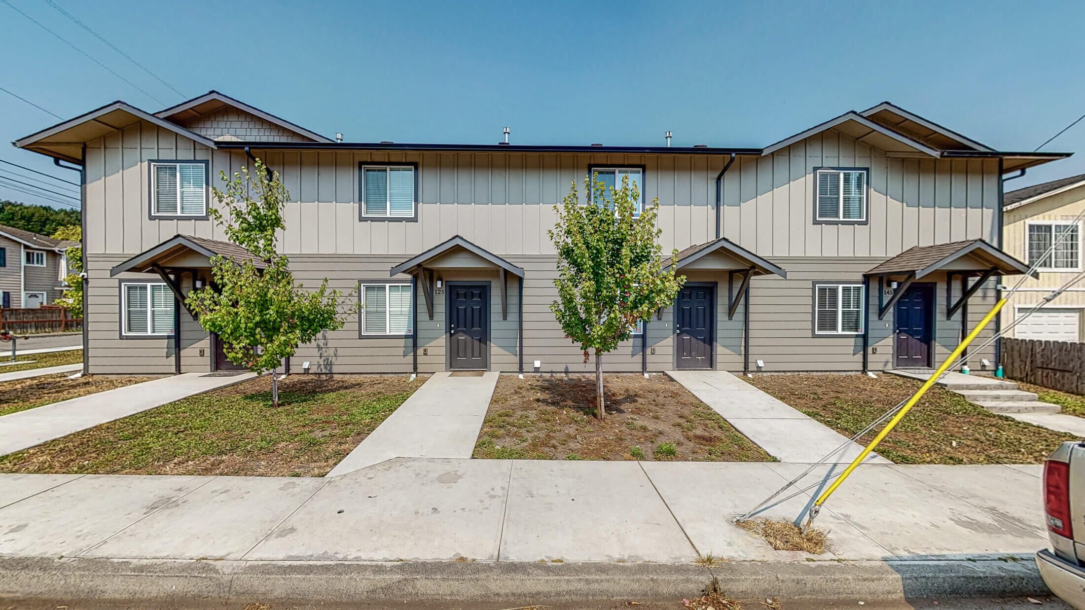 115-145 Berkeley Street Rio Dell, CA 95562 - Photo 1 of 1 a front view of a house with garden