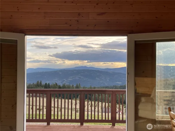 a view of a balcony with a ocean view