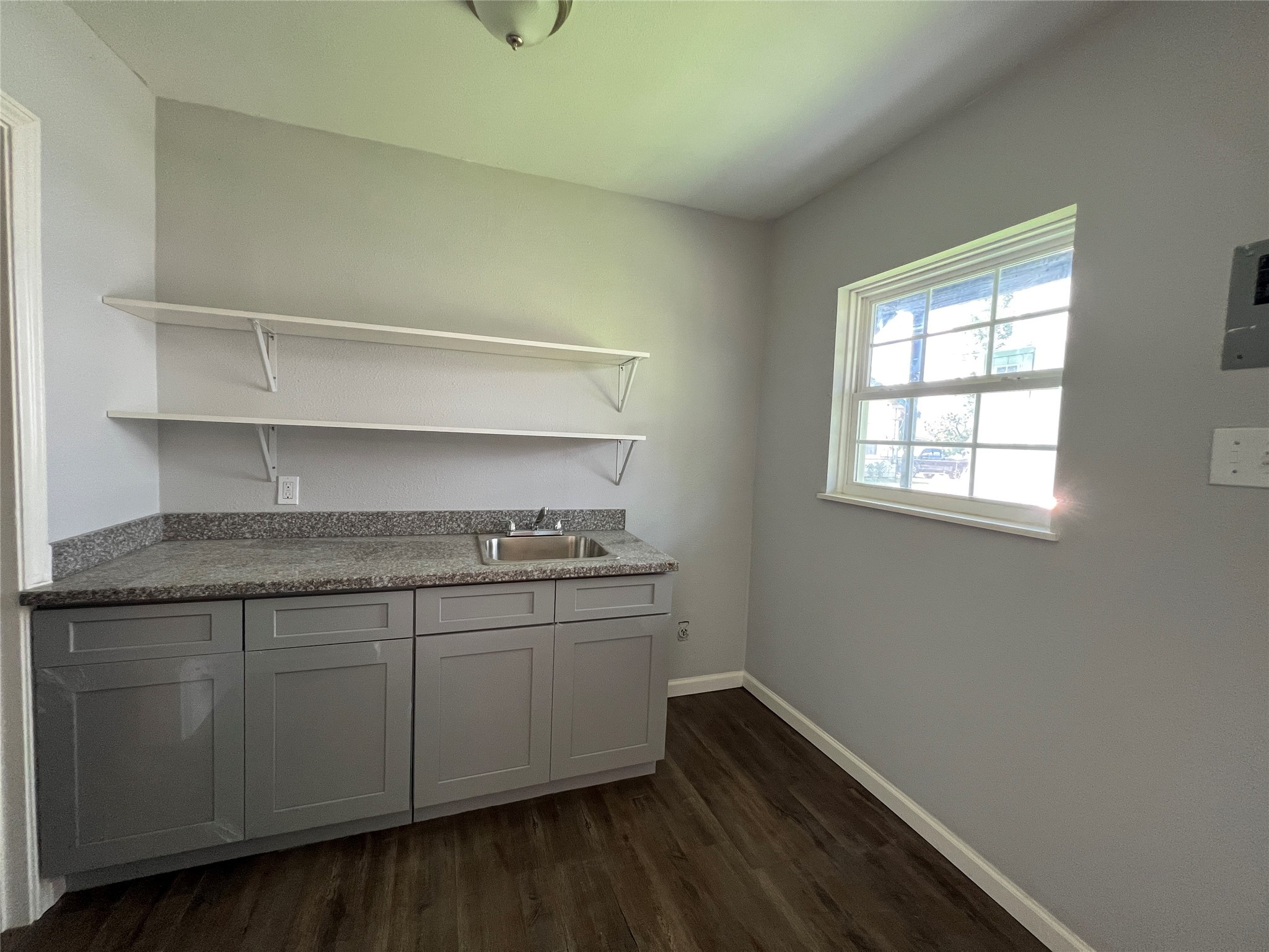 6823 Ave East Houston, TX 77011 - Photo 13 of 16 a hallway with washer and dryer