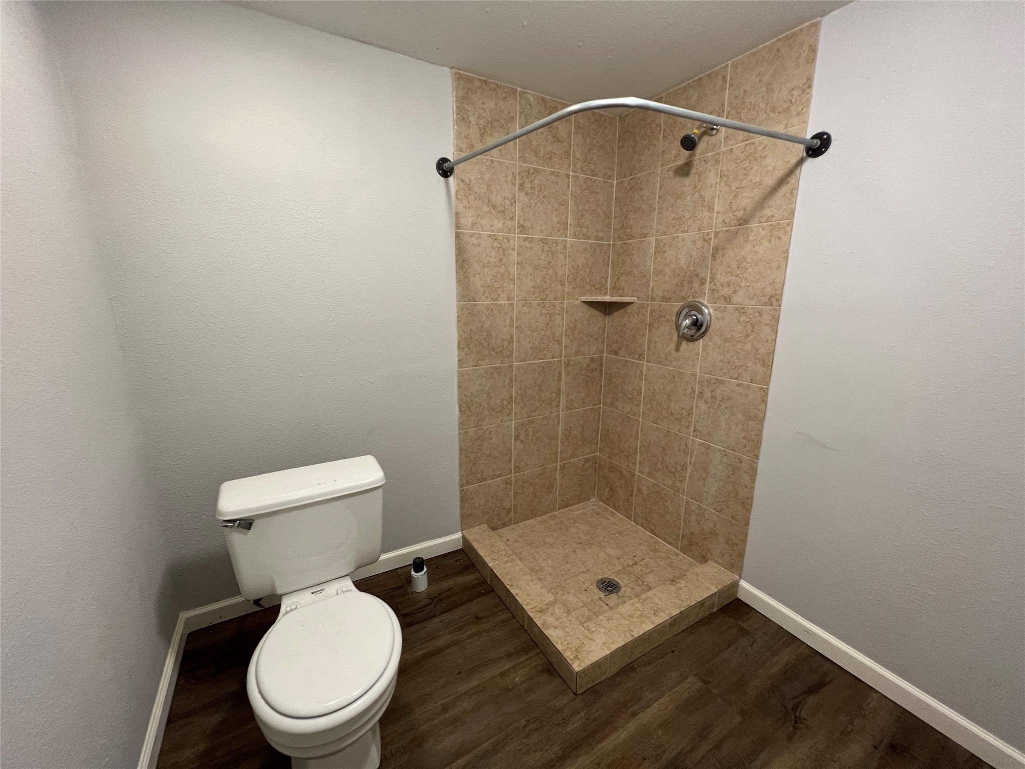 6823 Ave East Houston, TX 77011 - Photo 15 of 16 a bathroom with a toilet and a shower