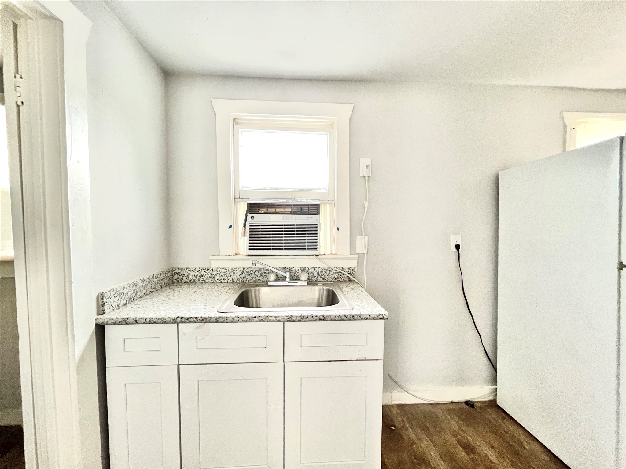 6823 Ave East Houston, TX 77011 - Photo 5 of 16 a sink sitting next to a window