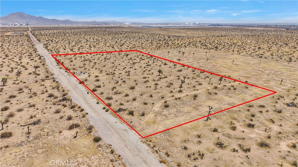 9770 Nichols Road Adelanto, CA 92301 - Photo 4 of 11 a view of balcony with wooden floor