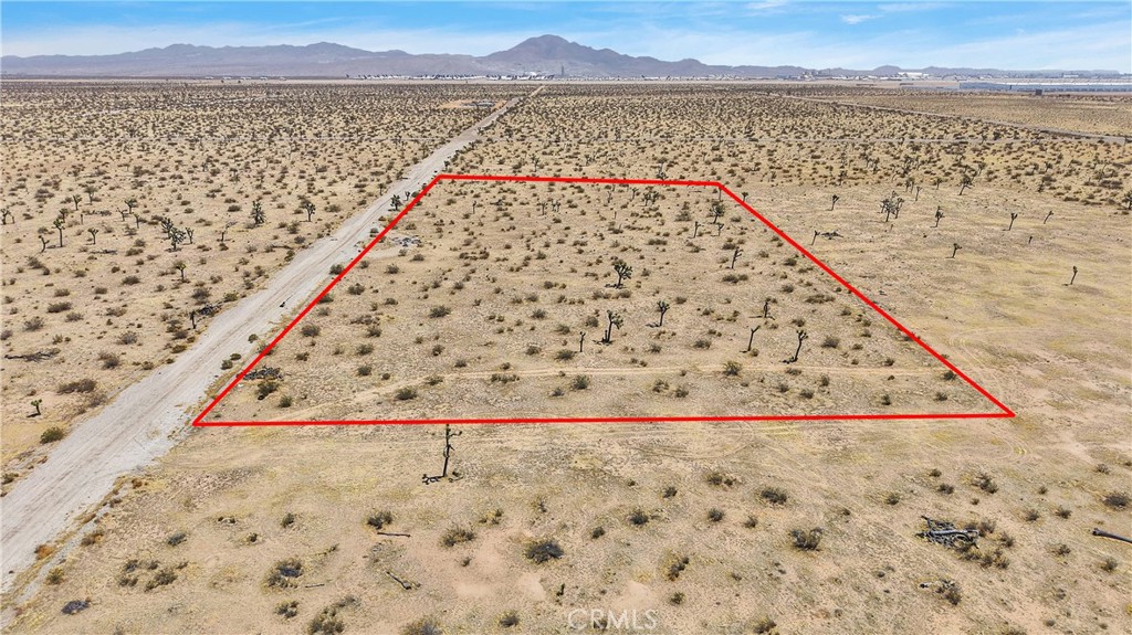 9770 Nichols Road Adelanto, CA 92301 - Photo 5 of 11 a view of wooden floor with a lake