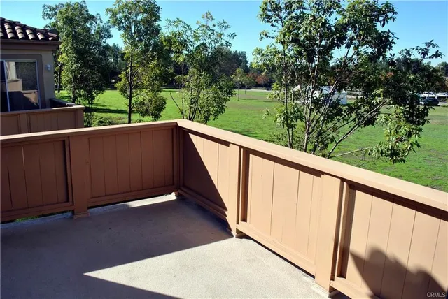 a view of a lake with a large trees