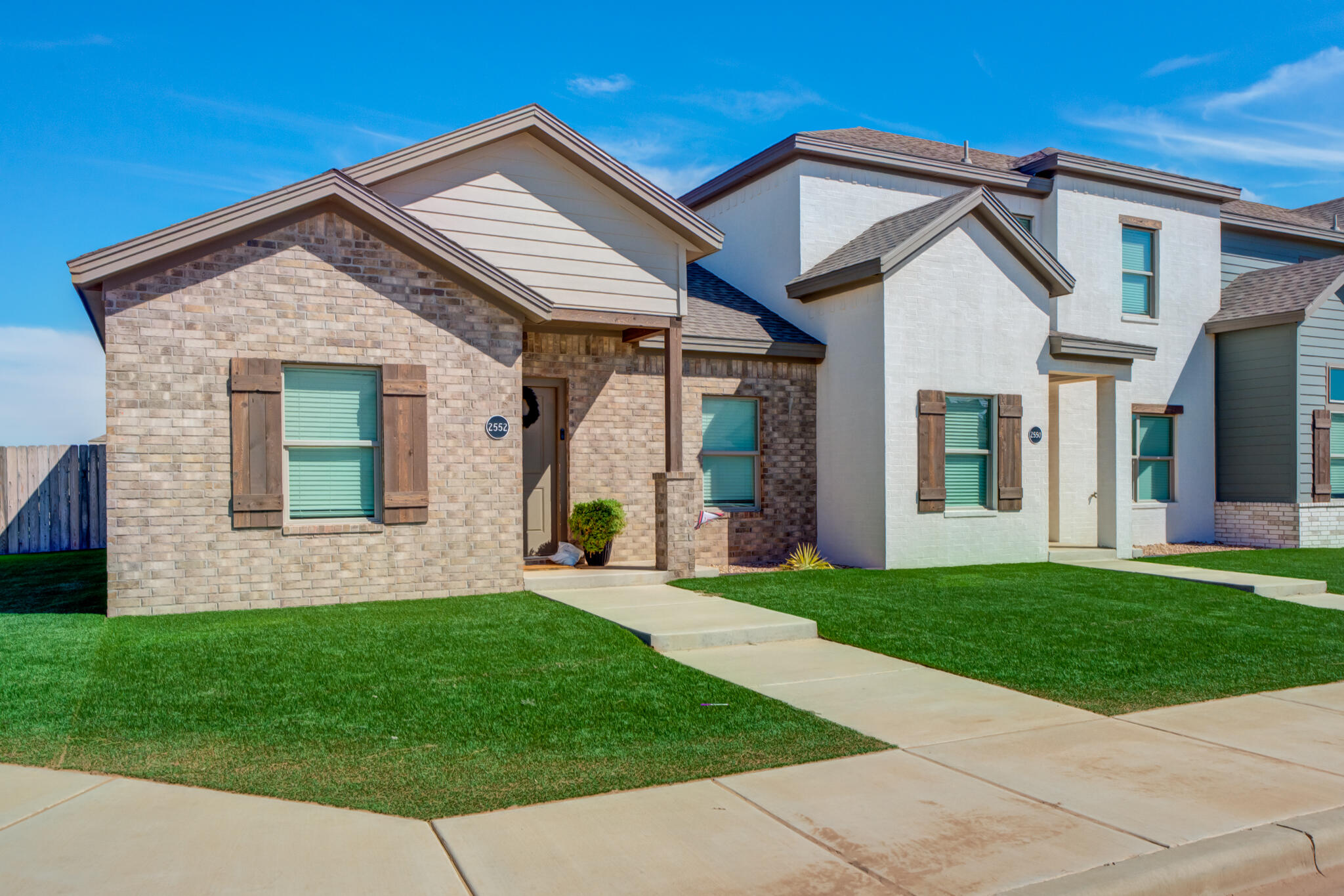 2544 137th Street Lubbock, TX 79423 - Photo 2 of 43 a front view of a house with a yard