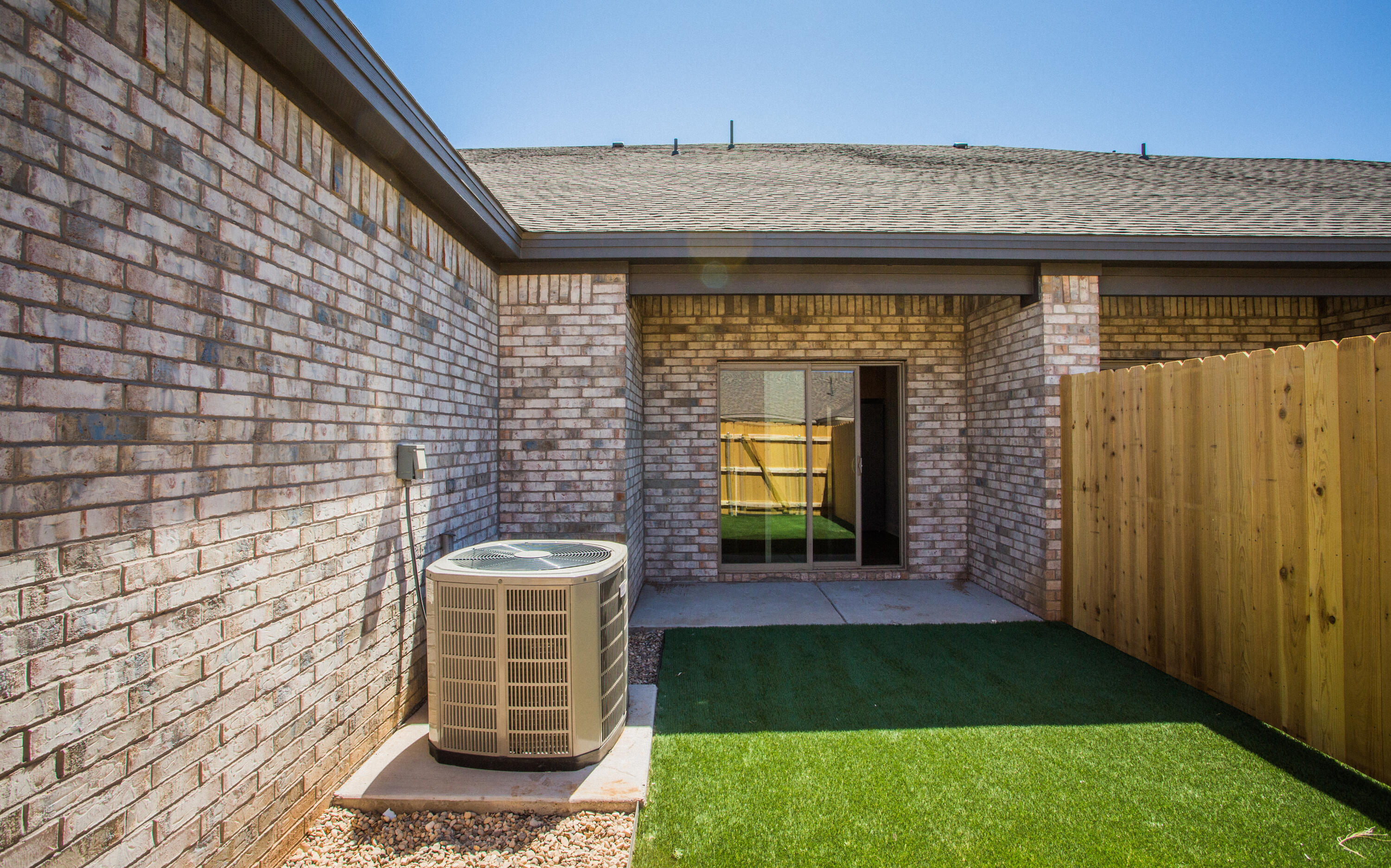 2544 137th Street Lubbock, TX 79423 - Photo 40 of 43 a front view of a house with a yard