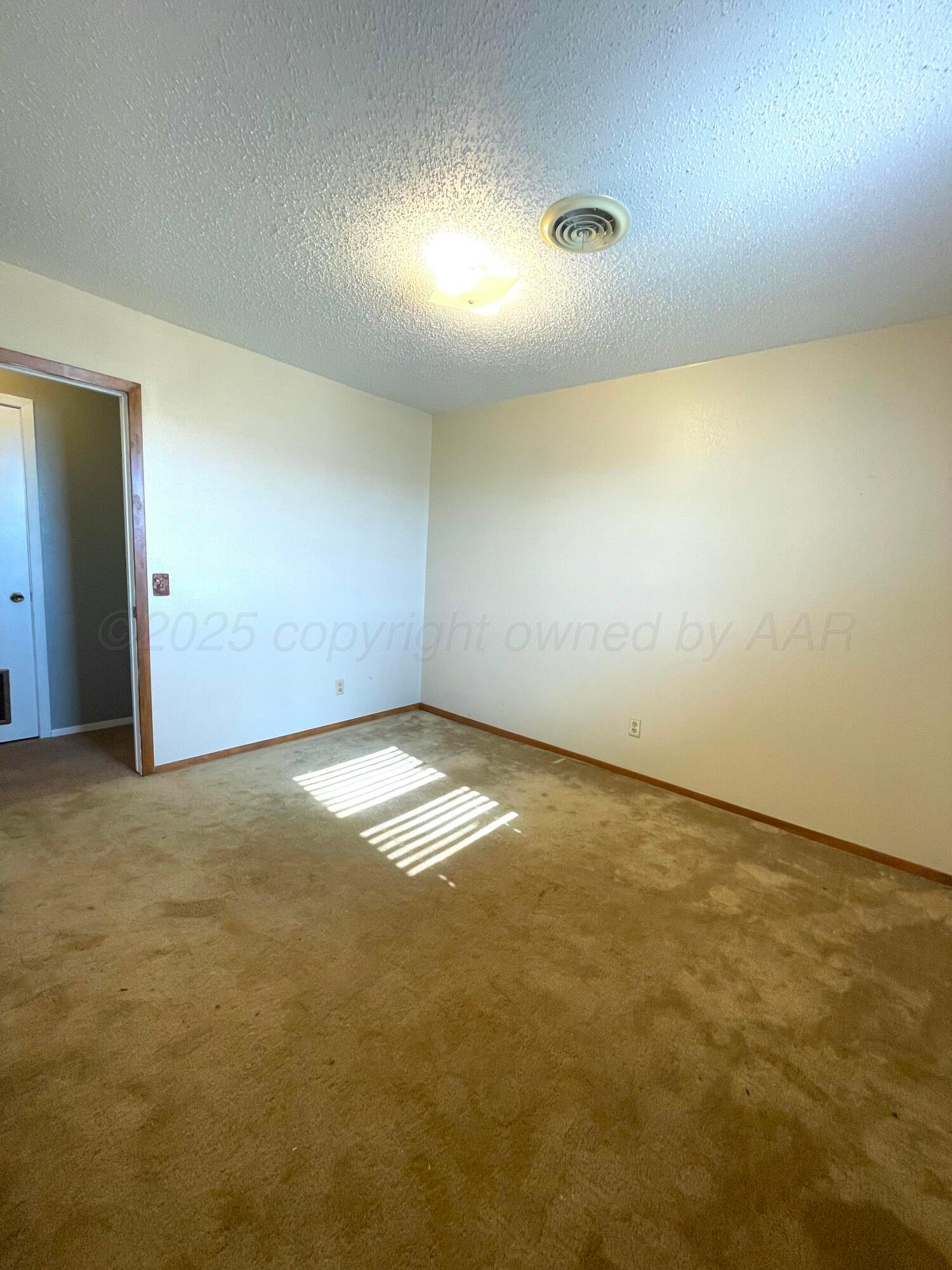 708 North Arizona Street Shamrock, TX 79079 - Photo 12 of 12 an empty room