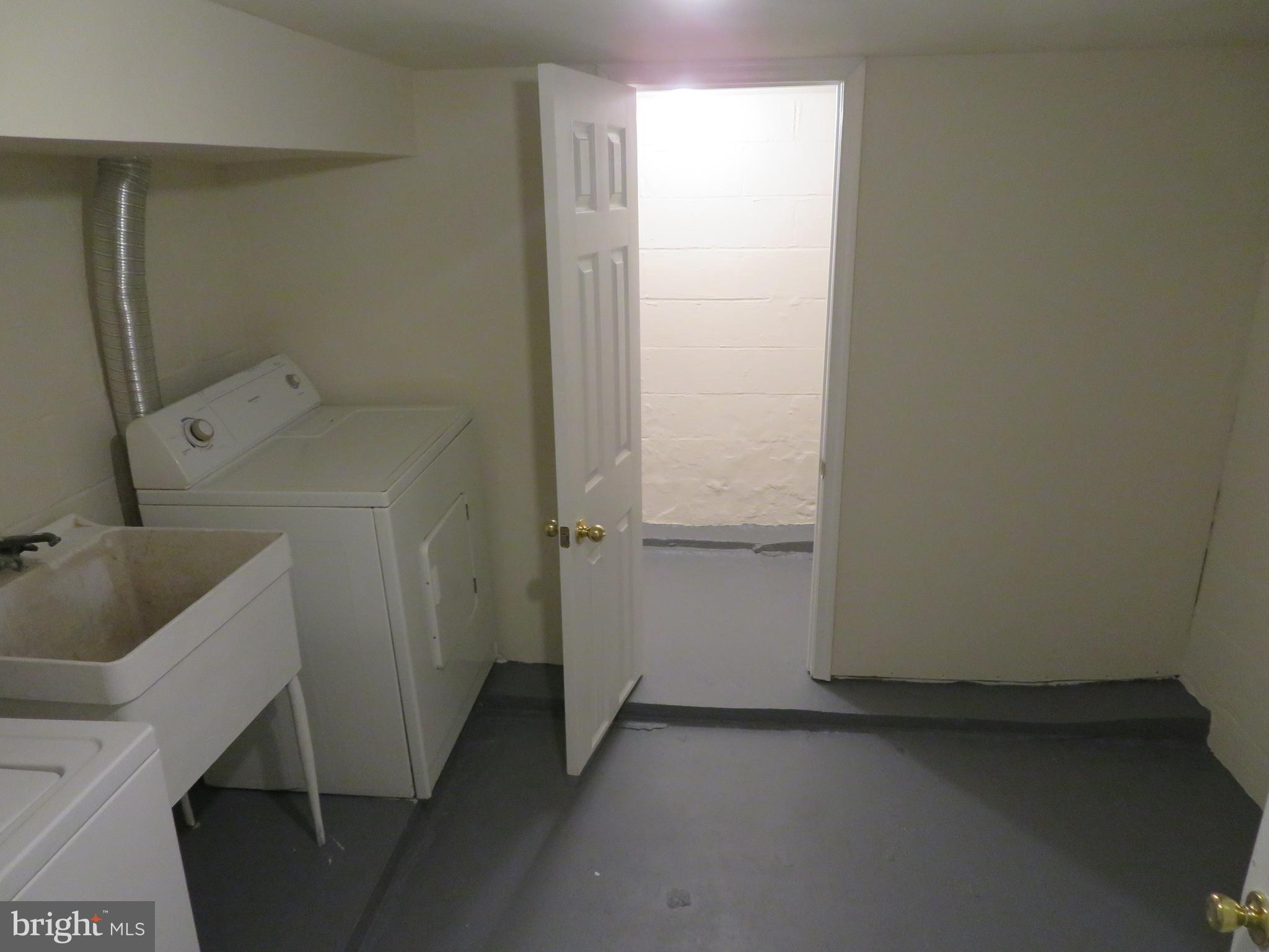 5414 Quesada Road Riverdale, MD 20737 - Photo 29 of 33 Basement Laundry Room with Separate Storage Area
