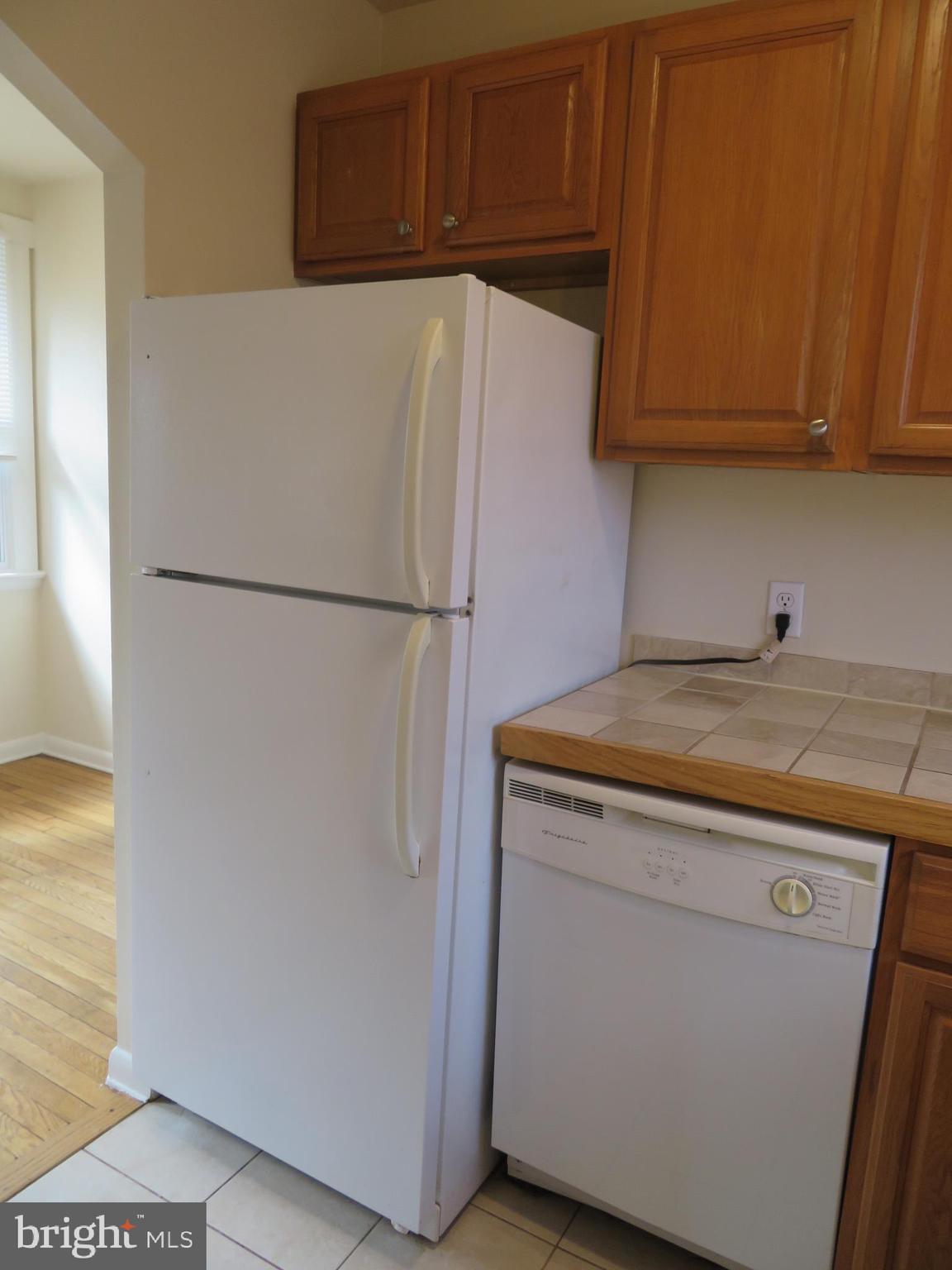 5414 Quesada Road Riverdale, MD 20737 - Photo 10 of 33 Kitchen Fridge and Dishwasher