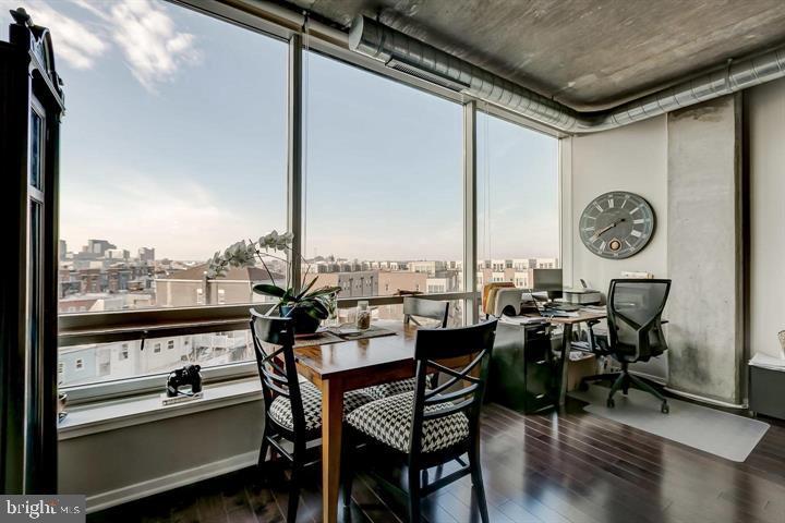 1200 Steuart Street, Unit 428 Baltimore, MD 21230 - Photo 27 of 53 a view of a chairs and table in a balcony