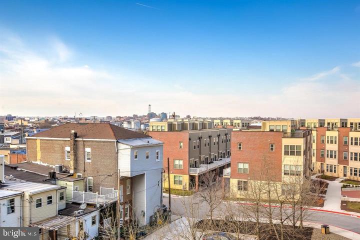 1200 Steuart Street, Unit 428 Baltimore, MD 21230 - Photo 46 of 53 a city view with tall buildings