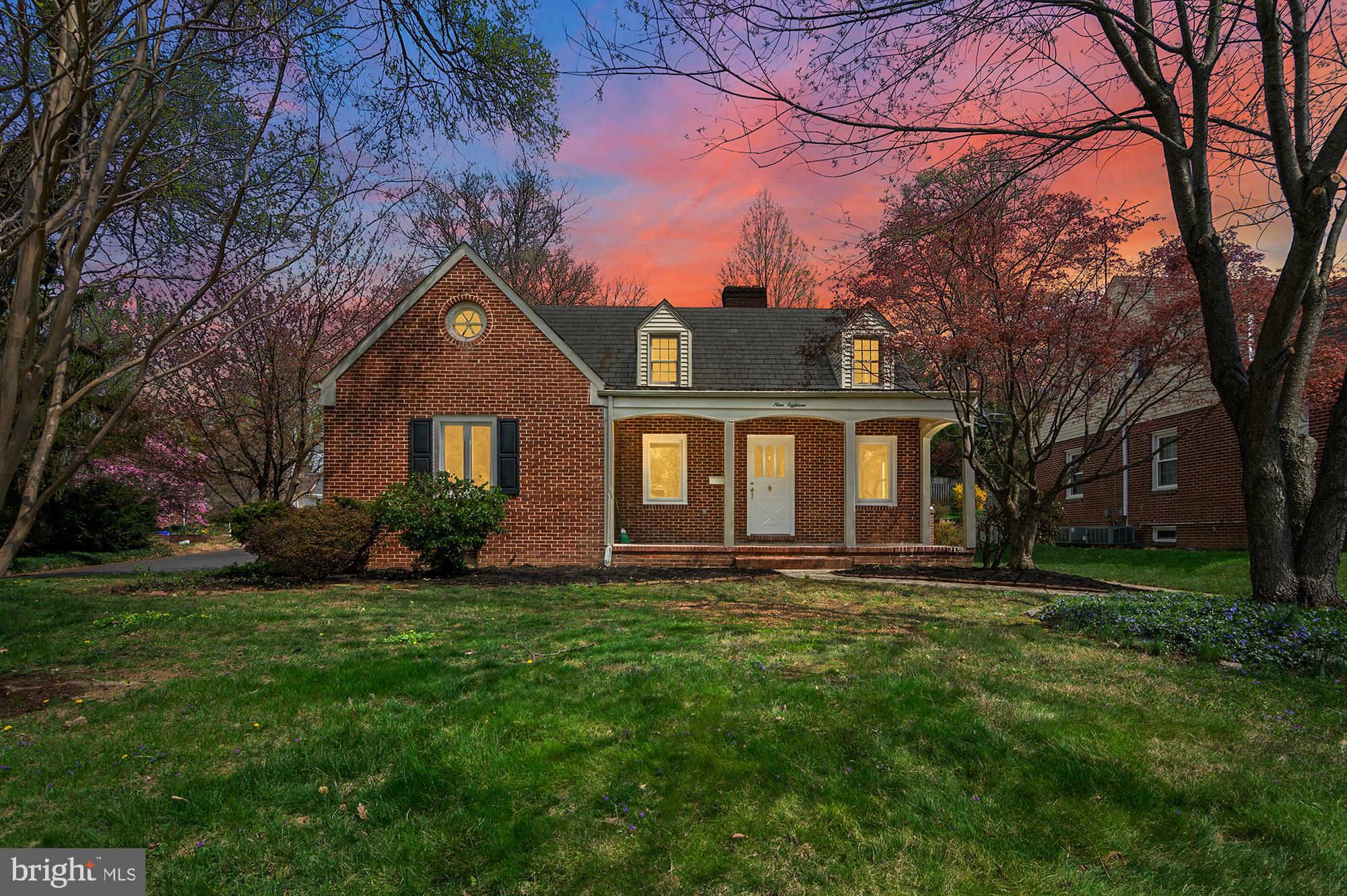 1200 Steuart Street, Unit 428 Baltimore, MD 21230 - Photo 52 of 53 a front view of a house with a yard