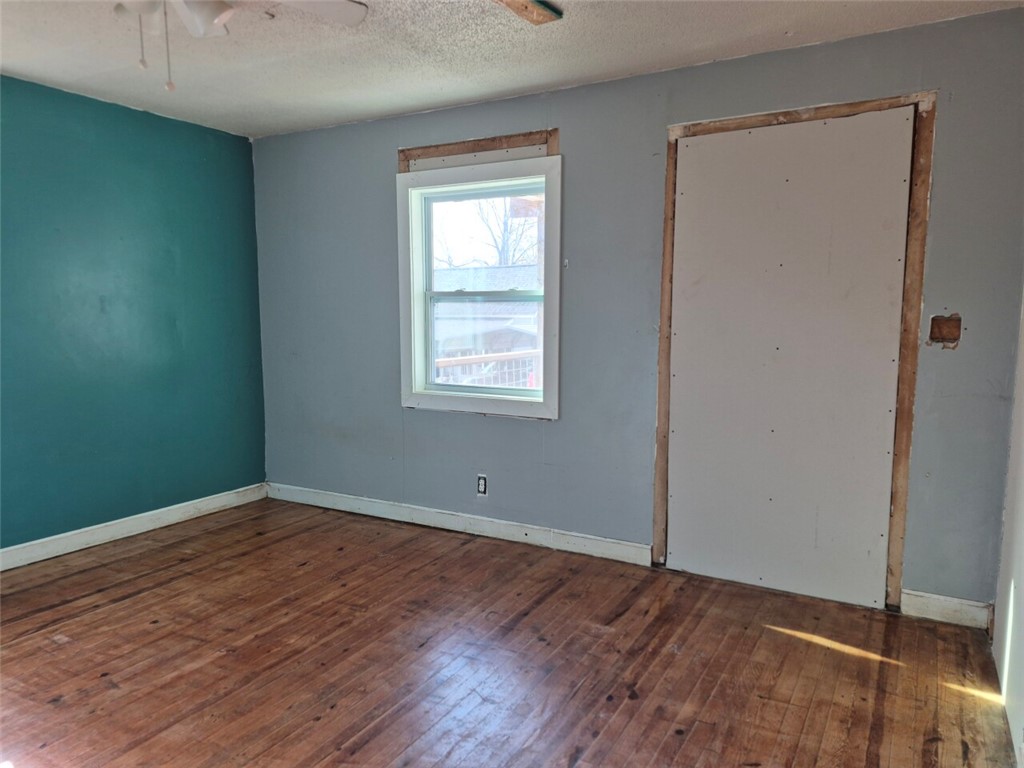 112 Overbrook Street Pickens, SC 29671 - Photo 11 of 19 This inviting bedroom features rich hardwood flooring and abundant natural light.