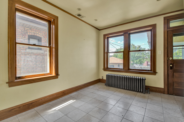 6727 Riverside Drive Berwyn, IL 60402 - Photo 12 of 30 an empty room with windows