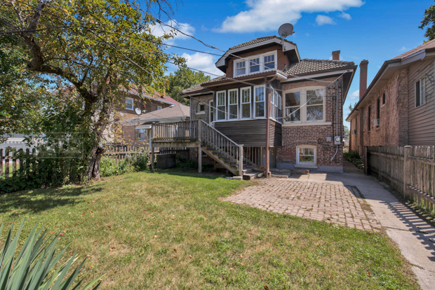 6727 Riverside Drive Berwyn, IL 60402 - Photo 30 of 30 a front view of a house with a yard
