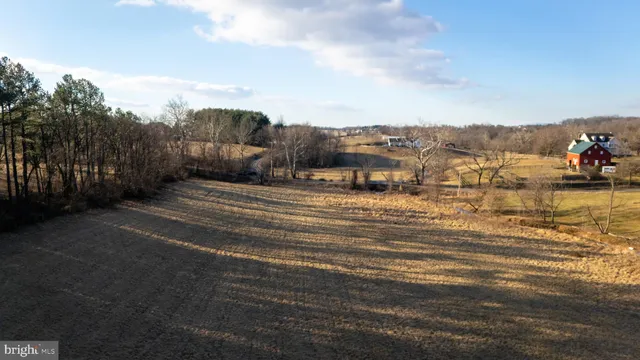 a view of a yard covered with snow