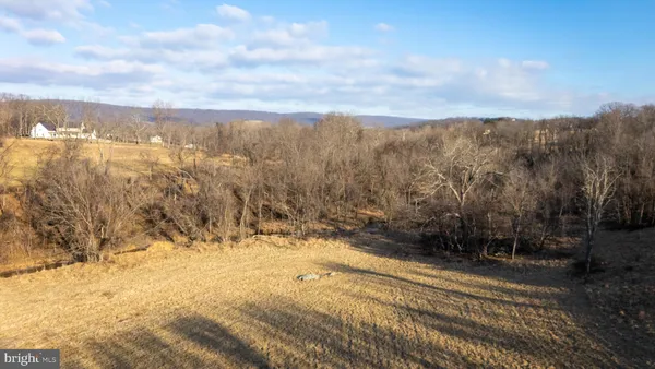 a view of a yard with mountain view