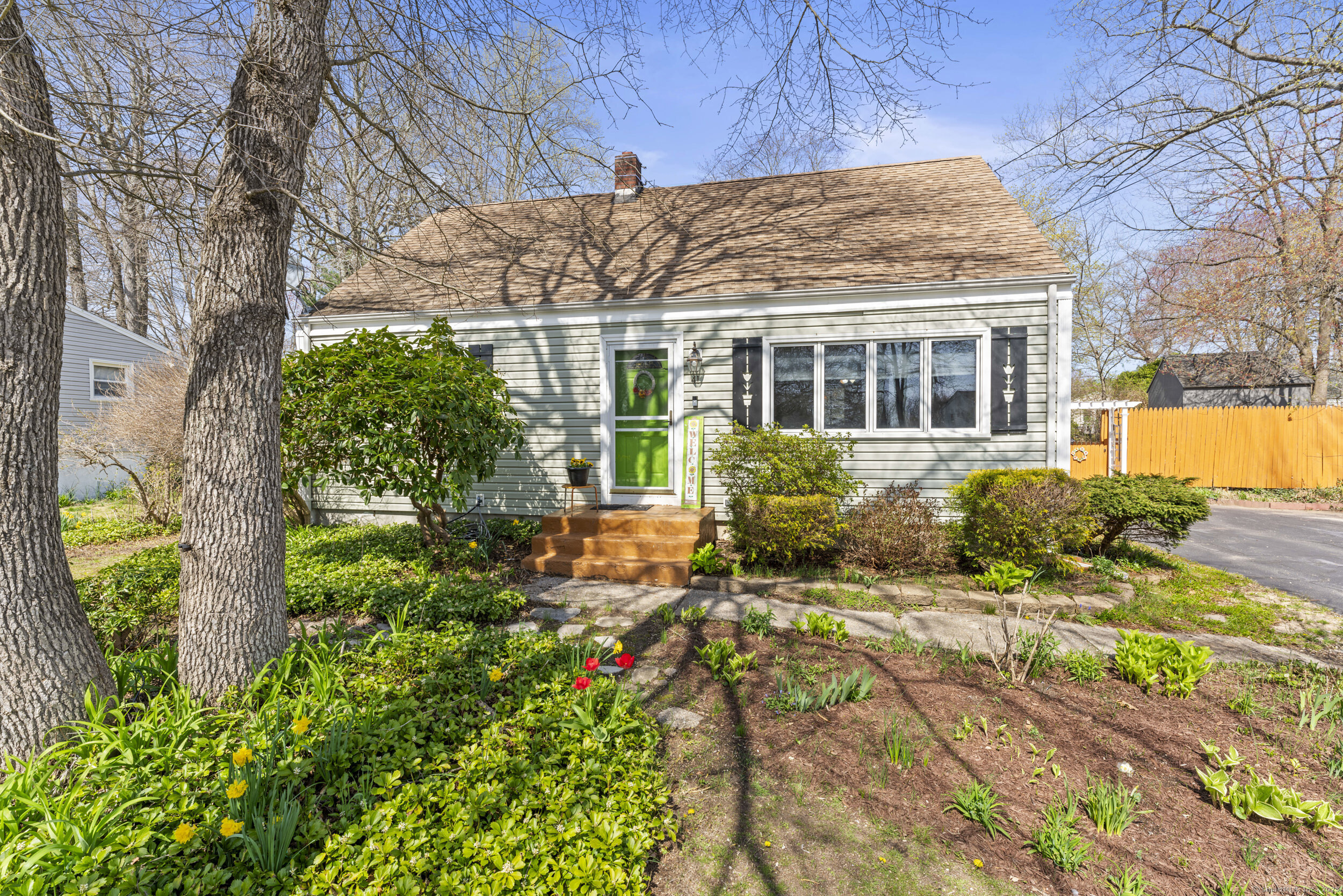 41 Oak Hill Road Montville, CT 06370 - Photo 1 of 28 front view of a house with a yard