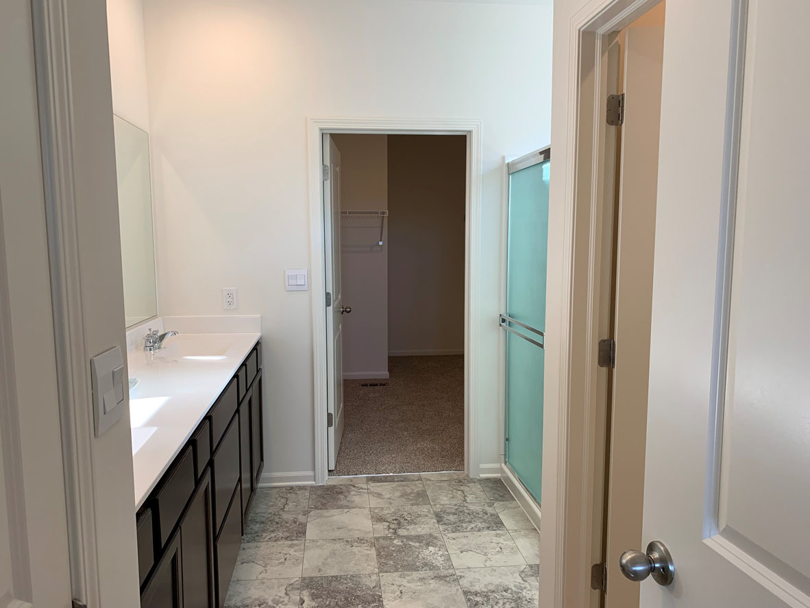 935 Eineke Boulevard Algonquin, IL 60102 - Photo 18 of 39 a bathroom with a sink and a mirror