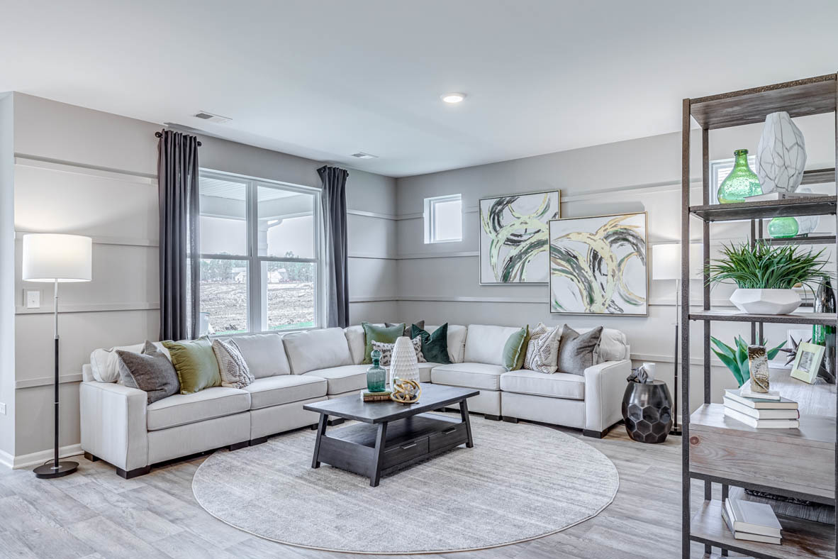 935 Eineke Boulevard Algonquin, IL 60102 - Photo 23 of 39 a living room with furniture and a large window