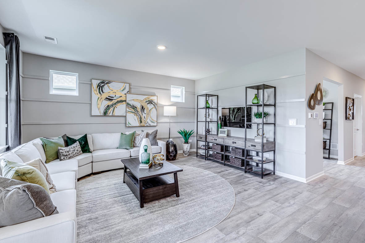 935 Eineke Boulevard Algonquin, IL 60102 - Photo 24 of 39 a living room with furniture and view of kitchen