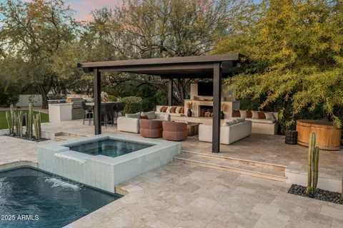 a view of a house with backyard and porch