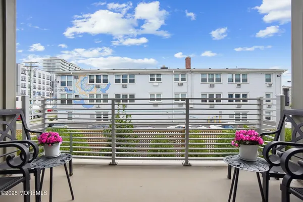 a flower is in a balcony