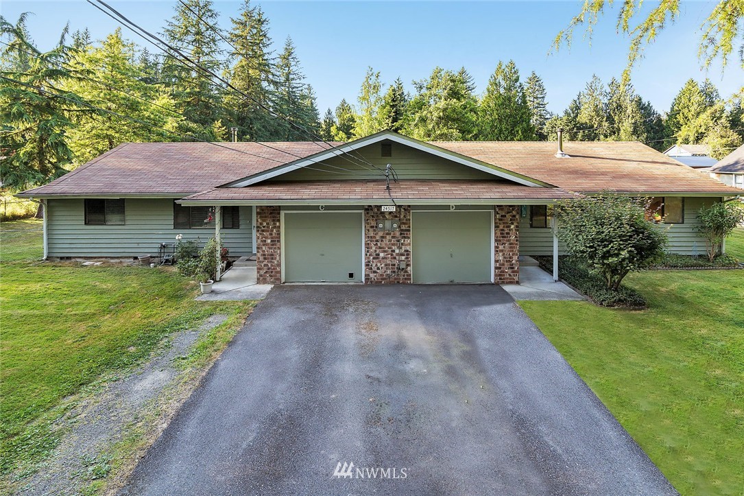 24517 Florence Acres Road Monroe, WA 98272 - Photo 1 of 14 a view of a house with yard and a garden