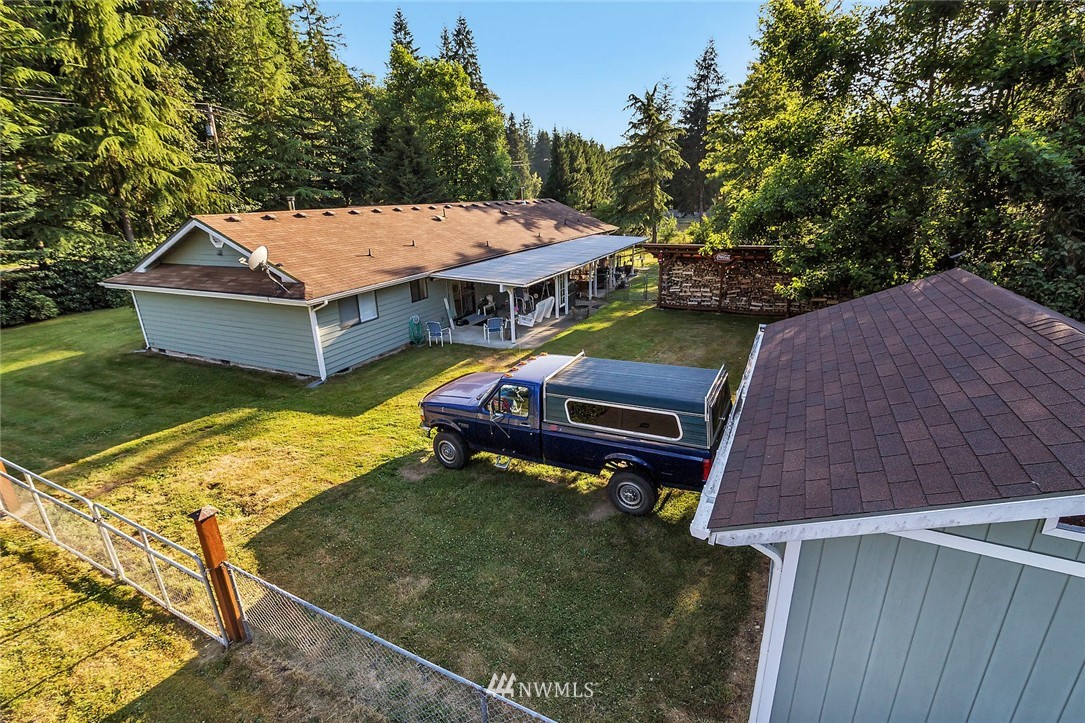 24517 Florence Acres Road Monroe, WA 98272 - Photo 14 of 14 a aerial view of a house with table and chairs
