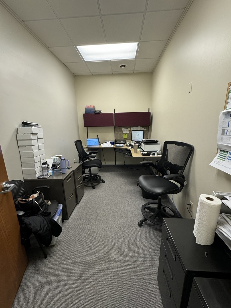 200 Ace Road, Unit 3 Princeton, IL 61356 - Photo 11 of 14 a room with a chair and gym equipment