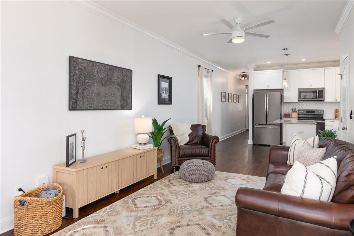 175 B Rural Avenue Nashville, TN 37209 - Photo 5 of 26 a living room with furniture and a chandelier