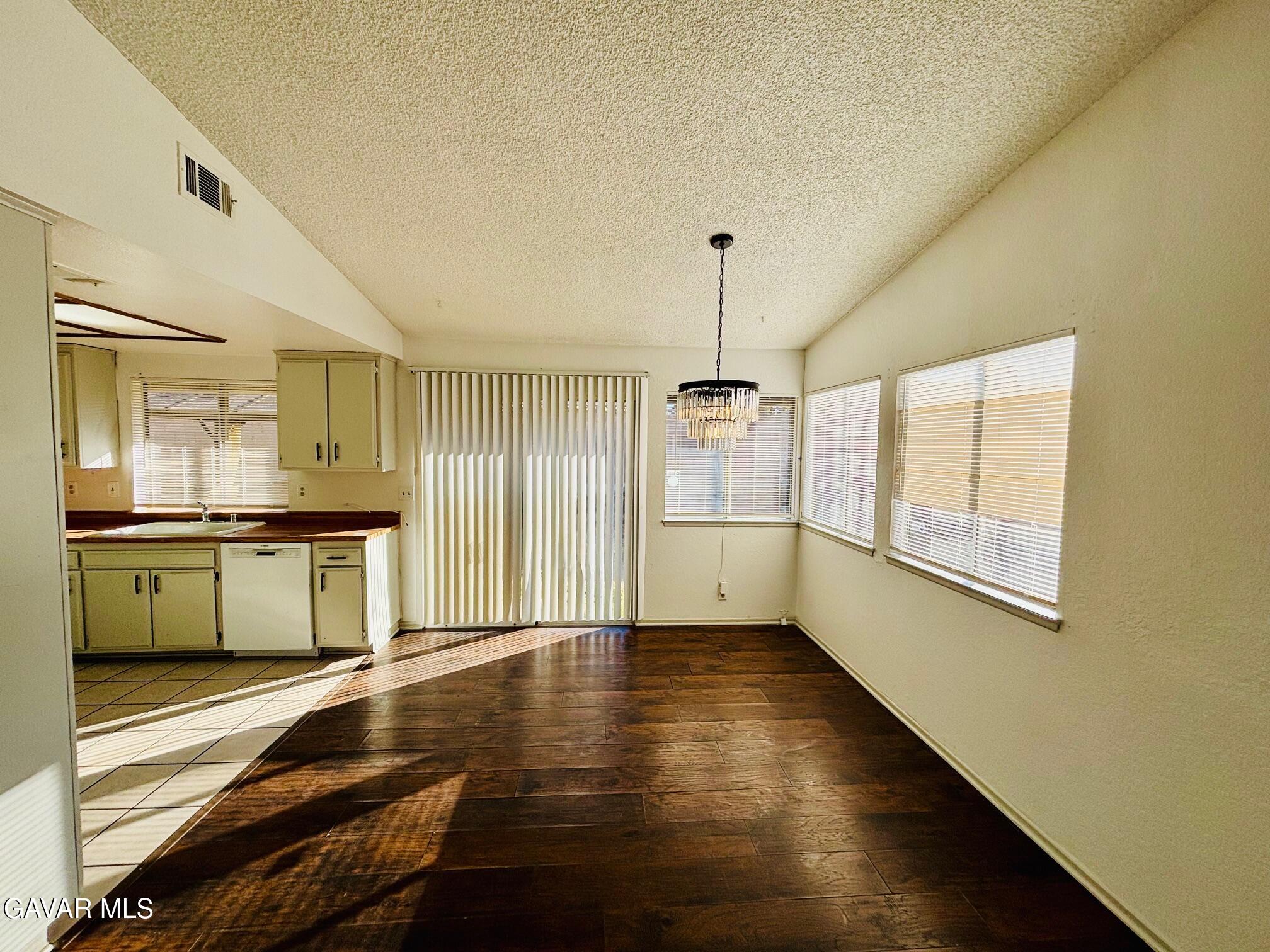 2308 Edam Street Lancaster, CA 93536 - Photo 4 of 16 a view of a kitchen with a sink and a window