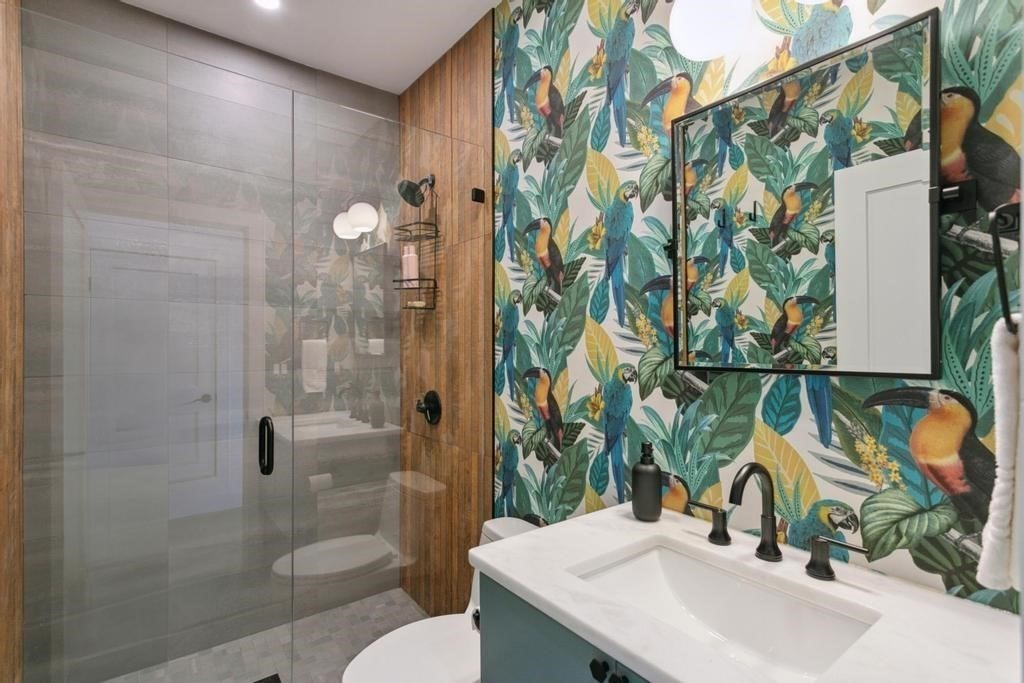 4 Payne Street, Unit 2 Boston, MA 02122 - Photo 19 of 28 a bathroom with a sink a toilet and shower