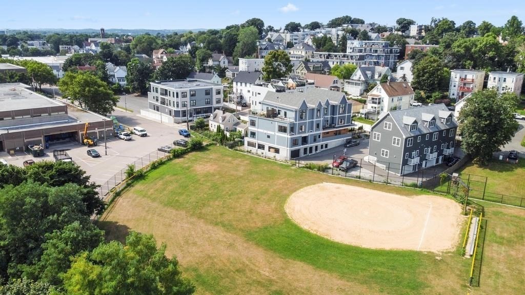 4 Payne Street, Unit 2 Boston, MA 02122 - Photo 26 of 28 an aerial view of residential house with outdoor space and swimming pool
