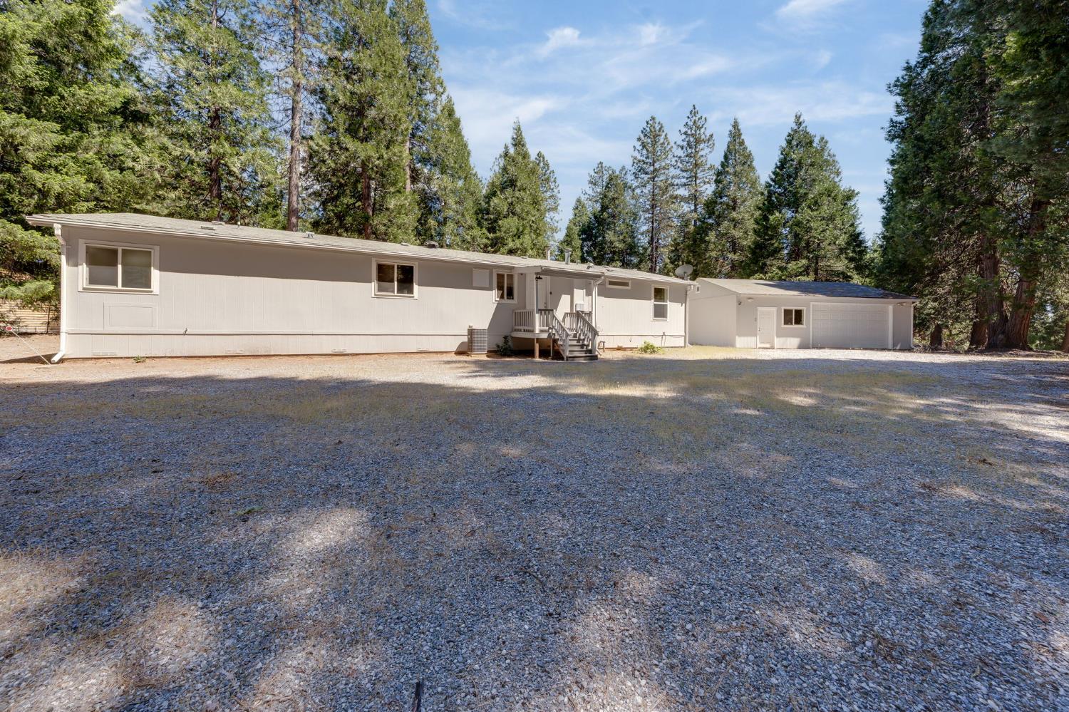 28722 Wood Road Pioneer, CA 95666 - Photo 5 of 39 a view of a back yard of the house