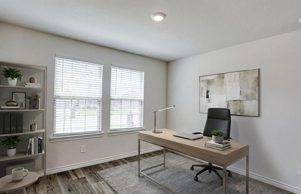 9813 Daisy Mae Aubrey, TX 76227 - Photo 11 of 28 a view of a workspace with furniture and a window