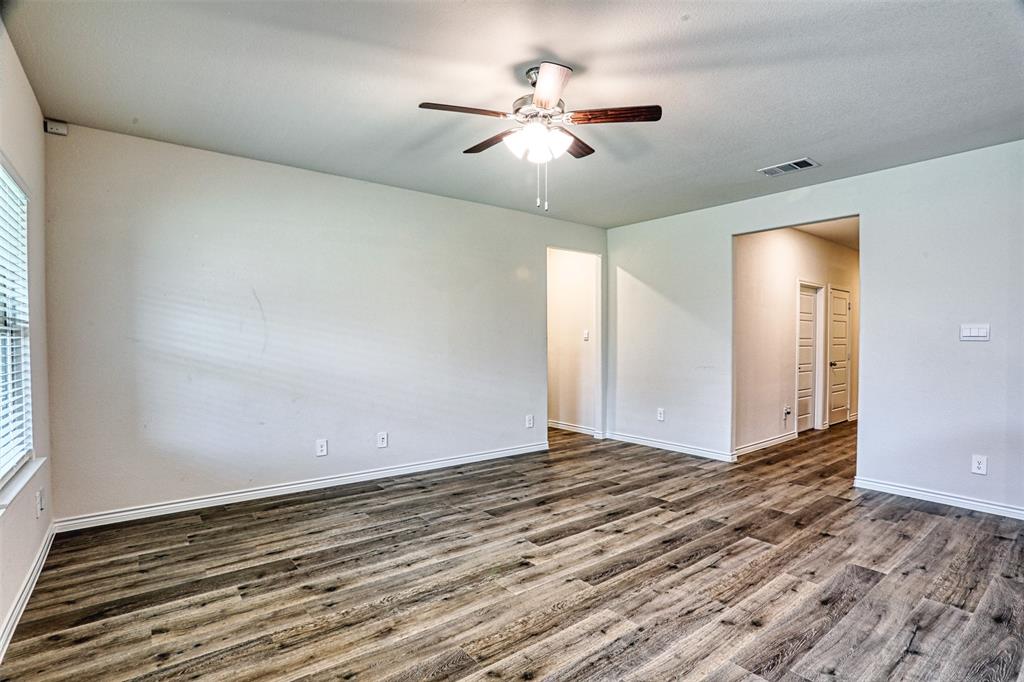 9813 Daisy Mae Aubrey, TX 76227 - Photo 13 of 28 wooden floor in an empty room