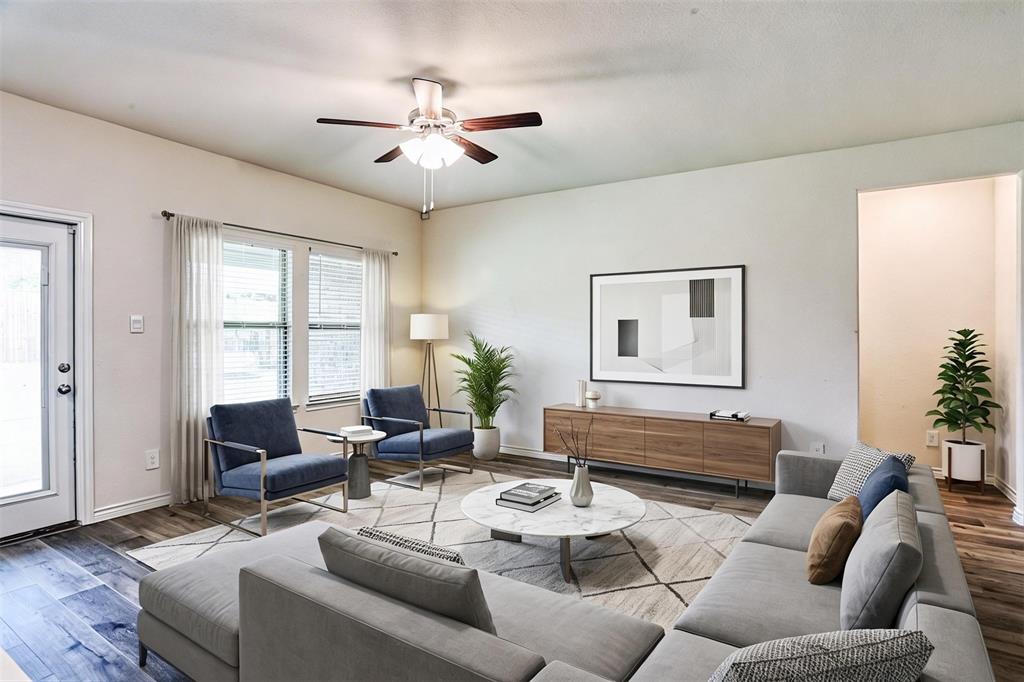 9813 Daisy Mae Aubrey, TX 76227 - Photo 15 of 28 a living room with furniture and three windows