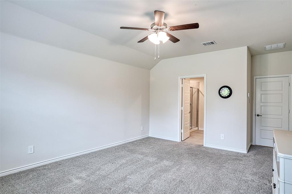 9813 Daisy Mae Aubrey, TX 76227 - Photo 16 of 28 an empty room with closet and a chandelier fan