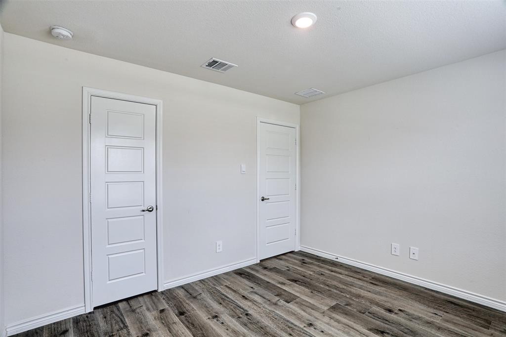 9813 Daisy Mae Aubrey, TX 76227 - Photo 22 of 28 a view of an empty room