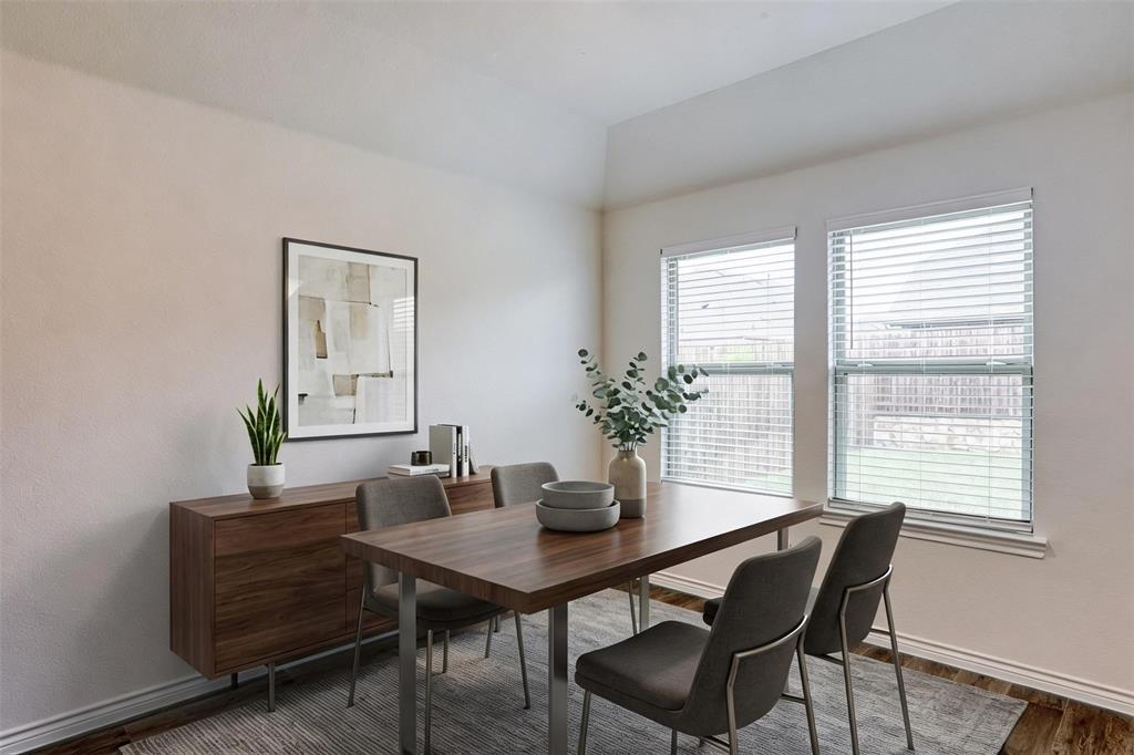 9813 Daisy Mae Aubrey, TX 76227 - Photo 9 of 28 a view of a dining room with furniture and window